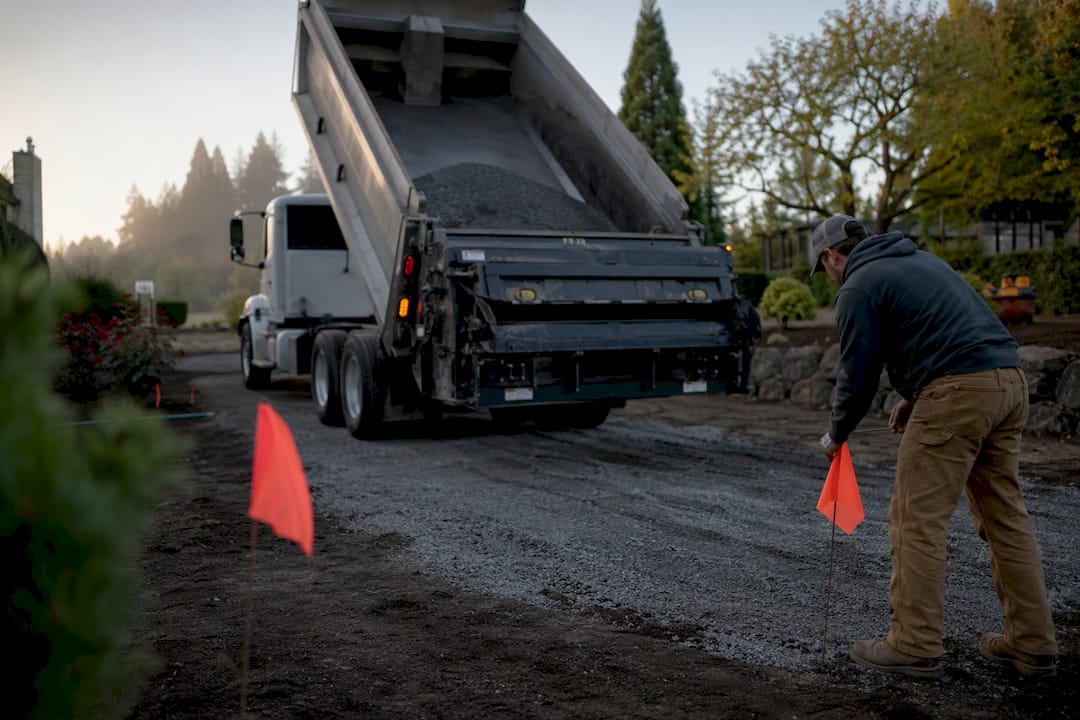 Gravel delivery day staging with marked dumping spot