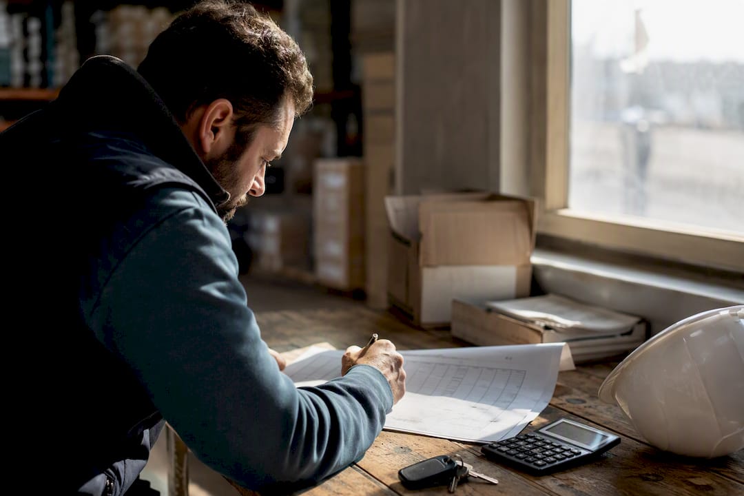Man checking diesel price data on paper